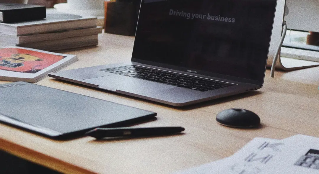 laptop in a design subscription agency